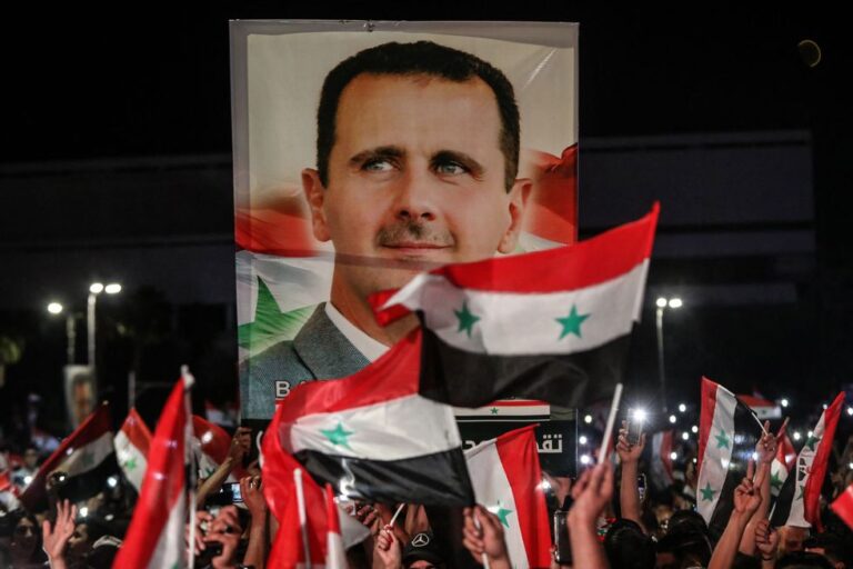 A portrait of Syrian president Bashar al-Assad, who has led a decade-long civil war that has left hundreds of thousands dead. Getty Images