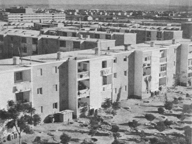 Two views of the monotonous dormitory-like pre-fab concrete apartments built for immigrants to Israel in the 1950s and early 1960s, at Kiryat Gat (top) and Upper Nazareth (bottom).