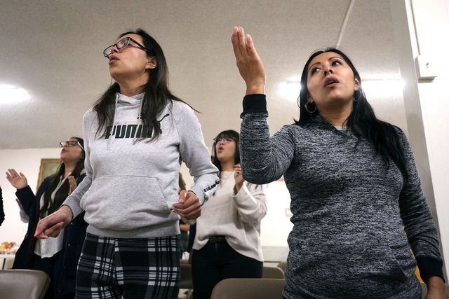 Young people sing during a 2019 revival meeting at the Most Precious Blood Catholic Church in Chula Vista, CA. Photo by David Maung.