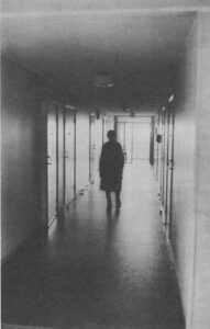 man walking in corridor