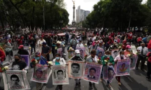 Relatives and classmates of the missing 43 Ayotzinapa college students march in Mexico City, on 26 September 2022. Photograph: Marco Ugarte/AP