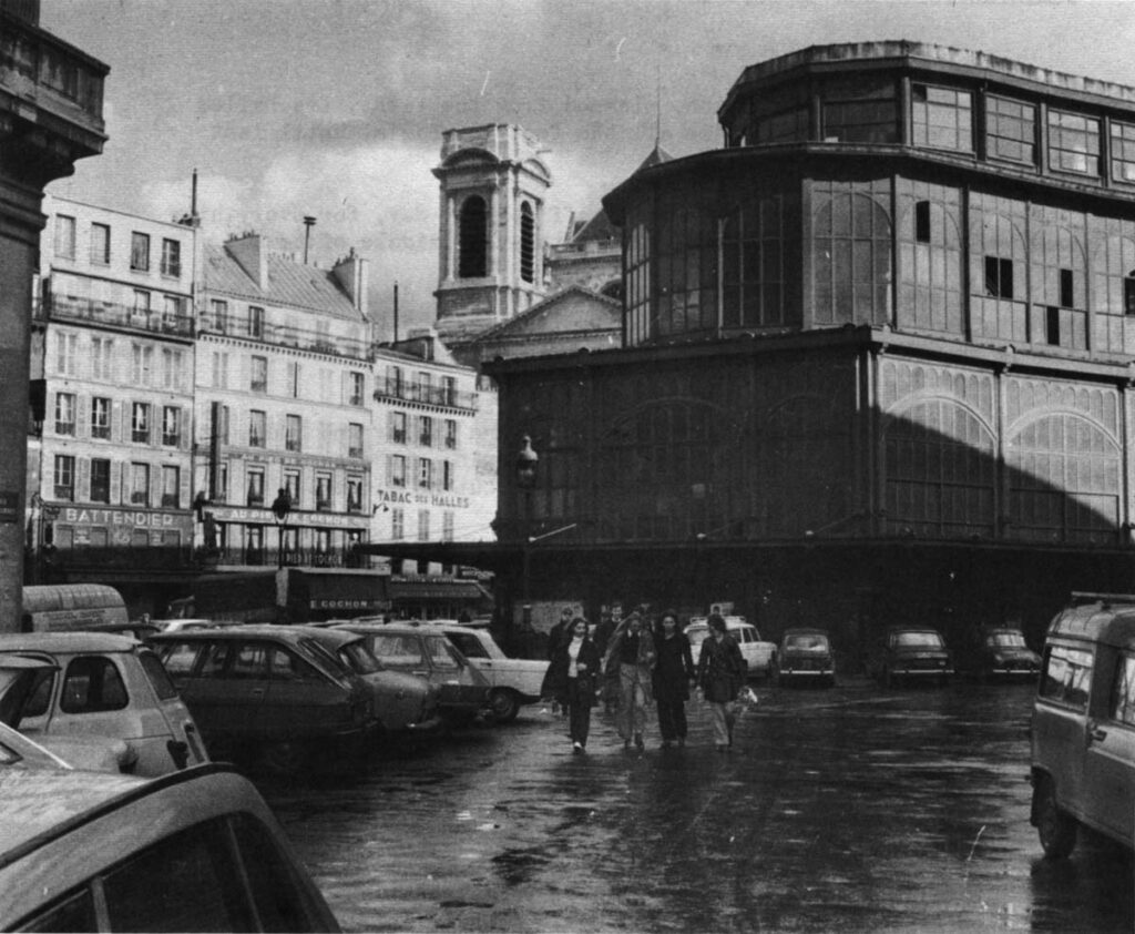 Four girls walk back from the ice skating rink installed temporarily in an unused pavilion of Les Halles. City officials are hassling over what to do with the site on a permanent basis.