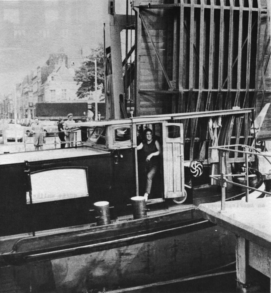 A barge slips along the canal that runs through Lille.