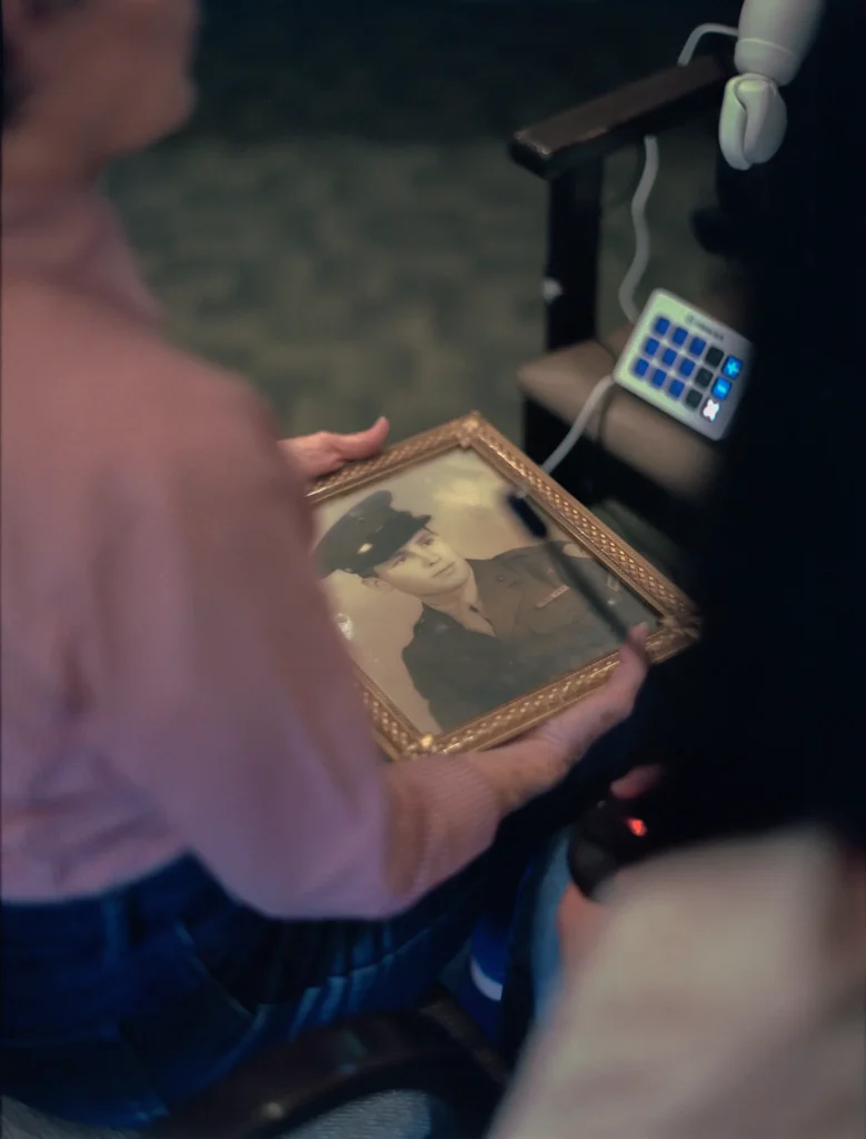 In Šabanović’s project, people with dementia bring in treasured photos to discuss with a robot. Photograph: Kayla Reefer