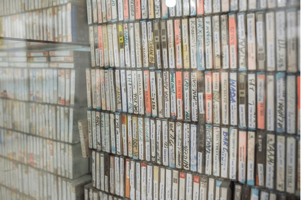 Archived cassette tapes inside the cultural center. (Mustafa Saeed/Noema Magazine)