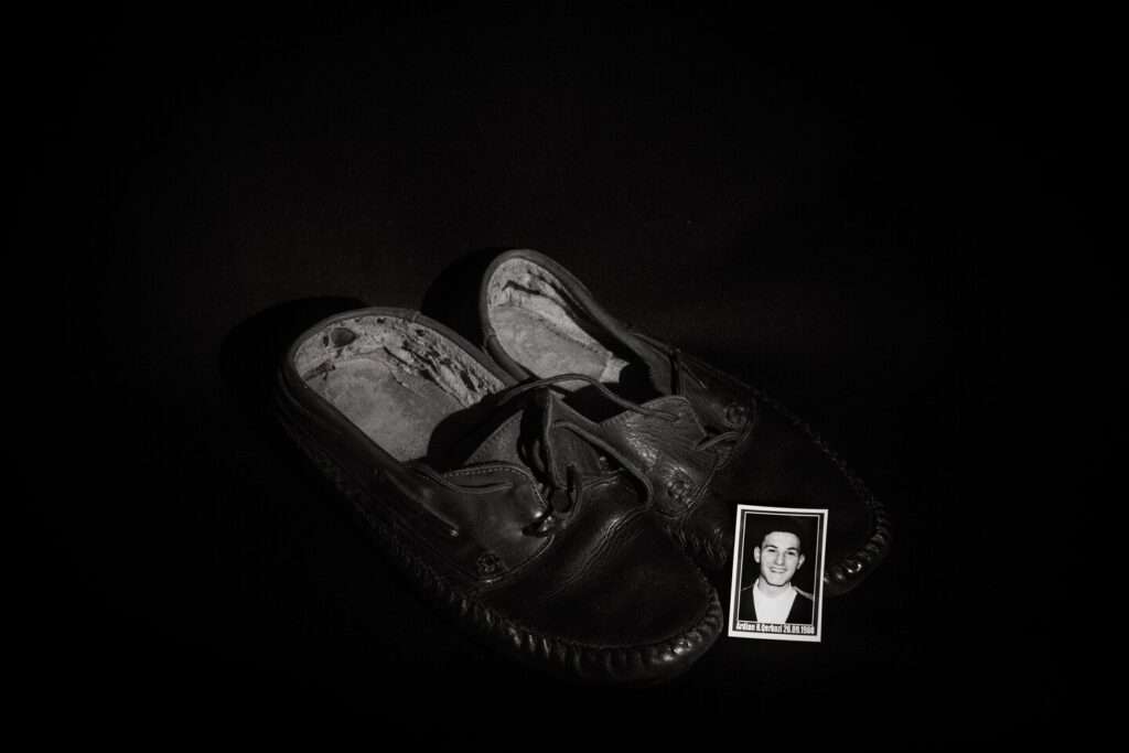 The shoes of Adrian Qerkezi, who was born on Sept. 26, 1980. (Diana Markosian for The Washington Post)