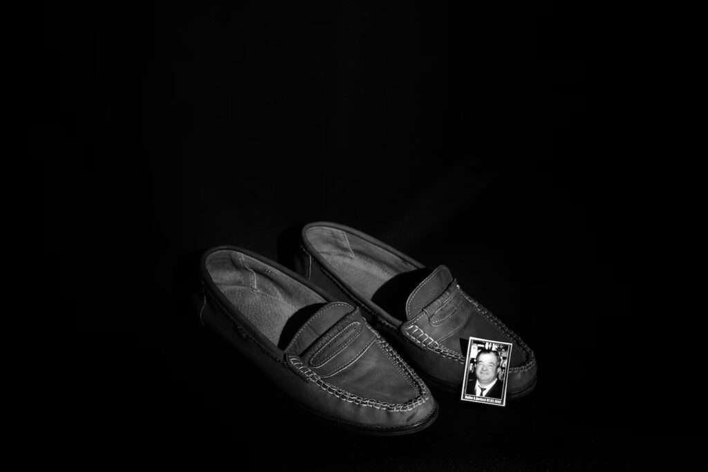 The shoes of Halim Qerkezi, who was born on March 7, 1946. (Diana Markosian for The Washington Post)