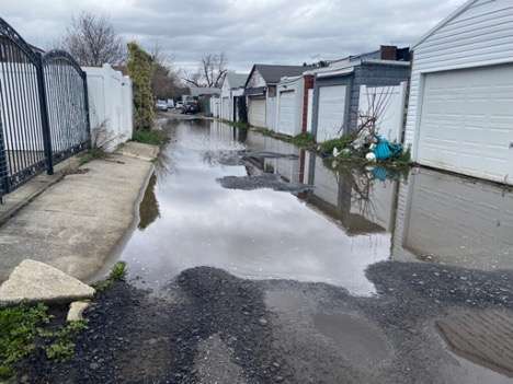 Ponding in St. Albans alleyways after three days of rain in early April 2024. (Roxanne Scott photo)