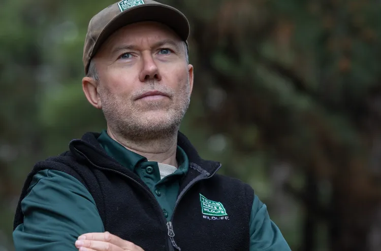 Paul Crump listens to bird and frog calls at the Yegua Knobbs Preserve in McDade, Texas. Julia Robinson for Vox