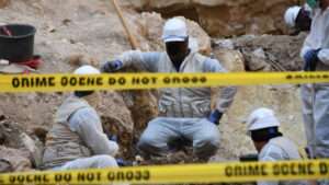Workers exhume the remains of bodies from a mass grave, presumably where Turkmens from Tal Afar were killed between 2014 and 2017 when ISIS controlled the region, Tal Afar district, Iraq, July 2024Image by picture alliance / Anadolu / Ali Makram Ghareeb ©v